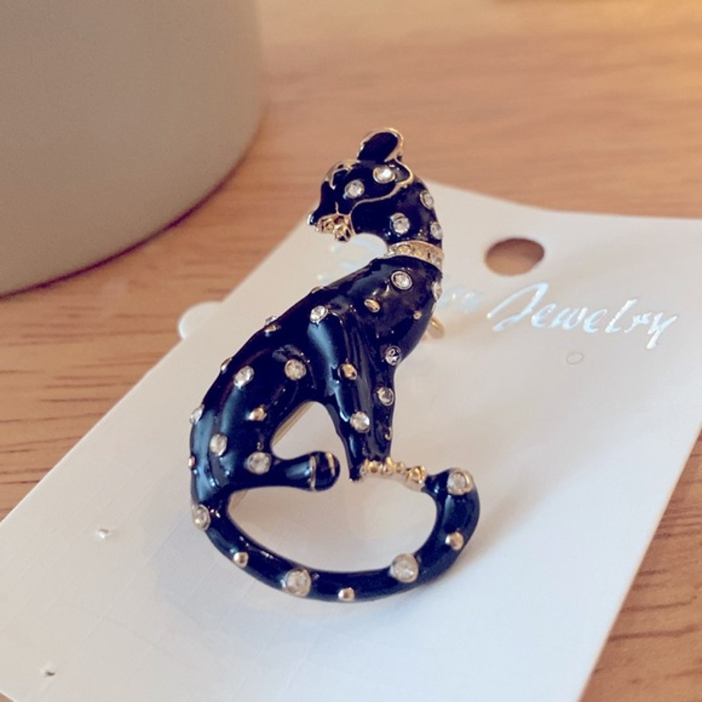 Panther Vintage Style Black and white enamel crystal brooch.